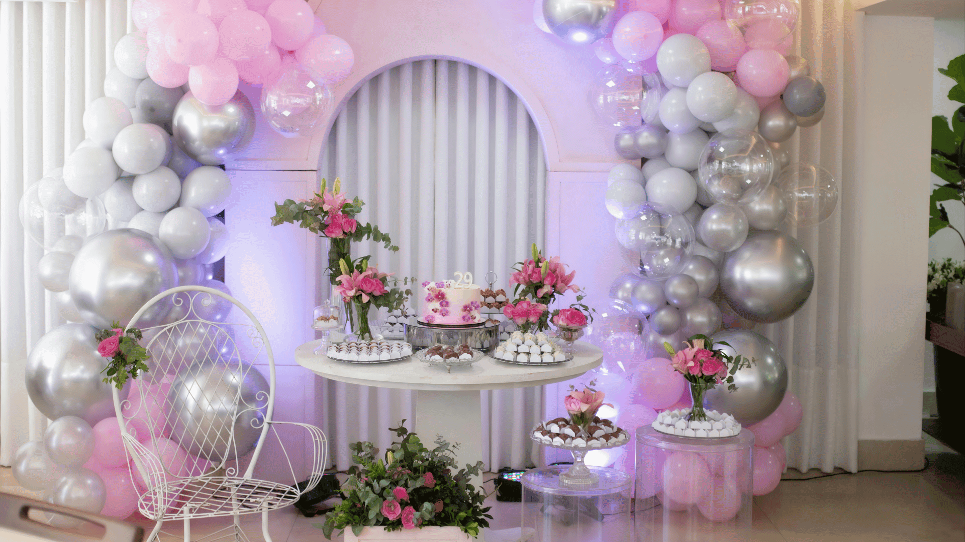 Pink and silver balloon arch decoration