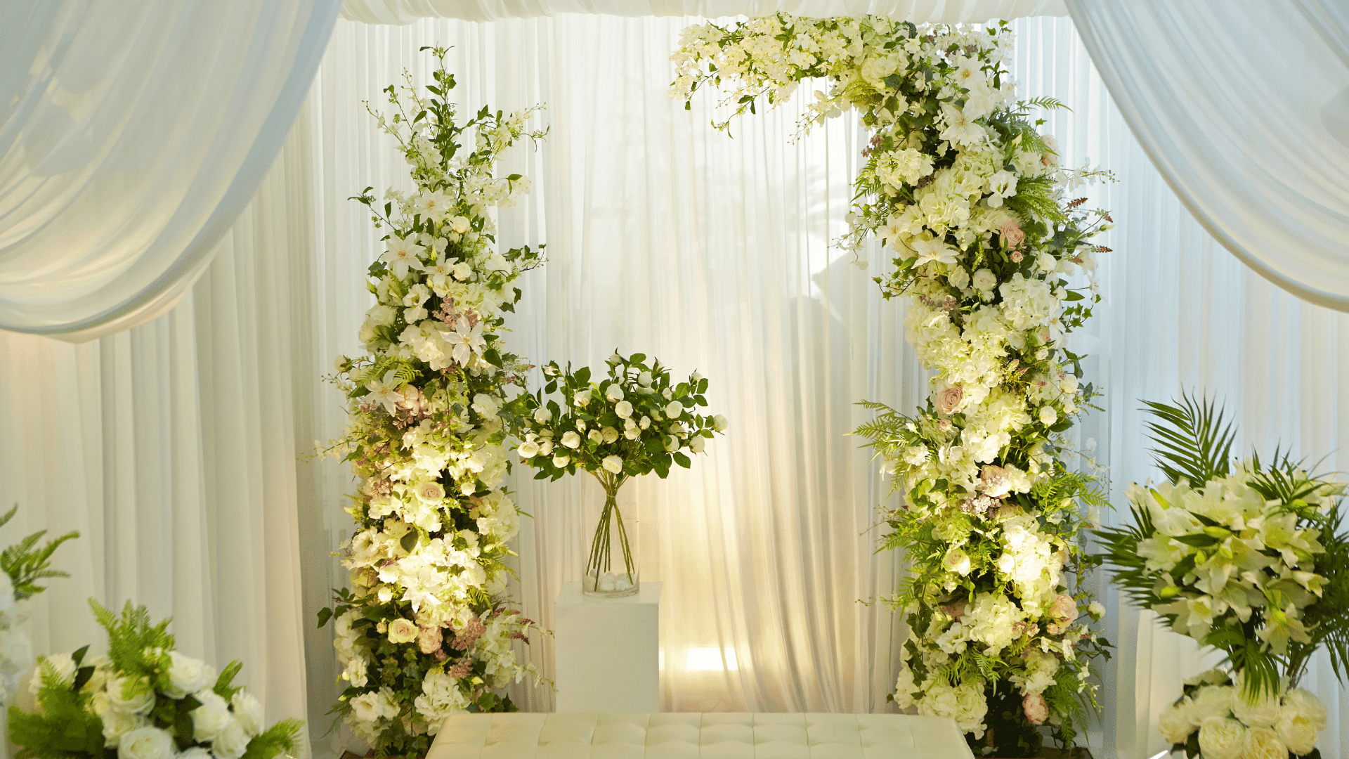 Elegant floral arch decoration by Four Kees Events